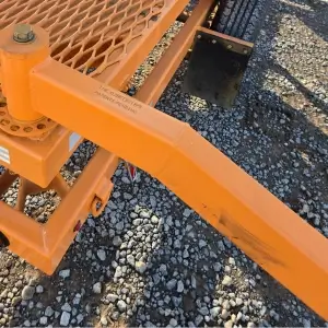 close up orange spyder leg jack stand extended
